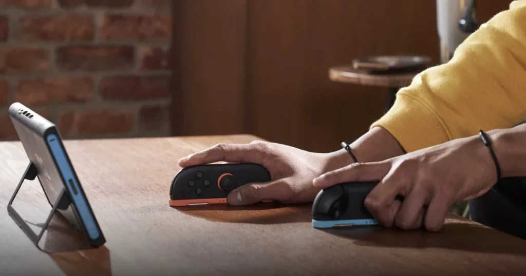 Nintendo Switch 2 en modo sobremesa con un Joy-Con 2 usado como ratón